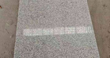 西藏芝麻白光面毛板